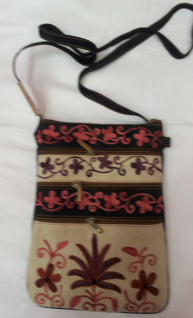 embroidered sling bag