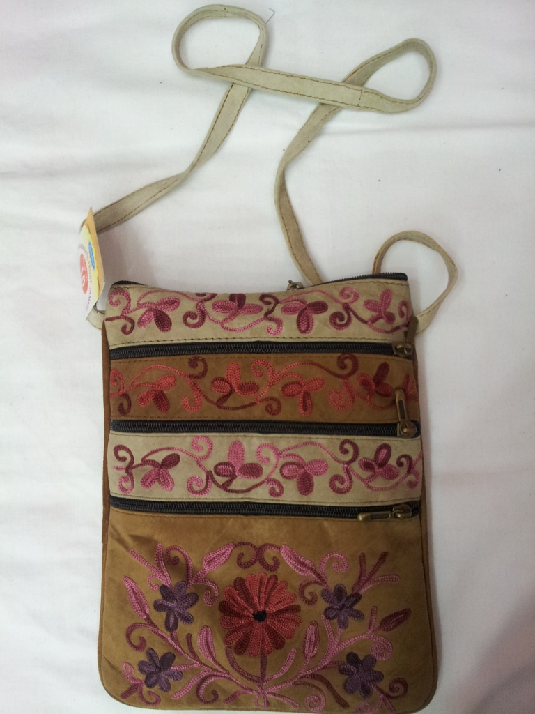 embroidered sling bag