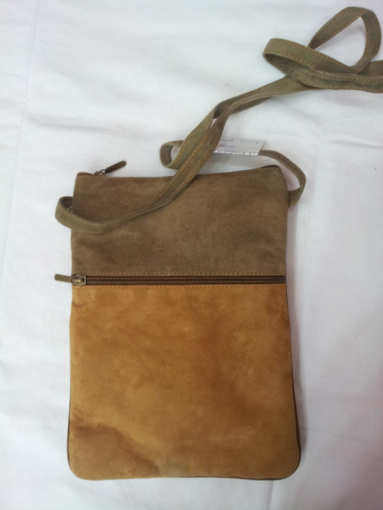 embroidered sling bag